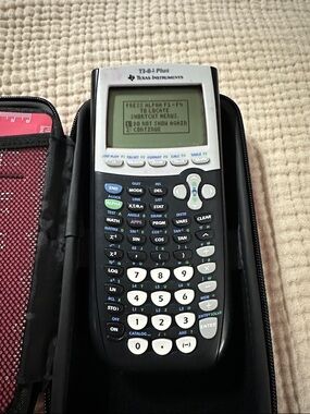 TI 84 graphing calculator with Pink Travel Case